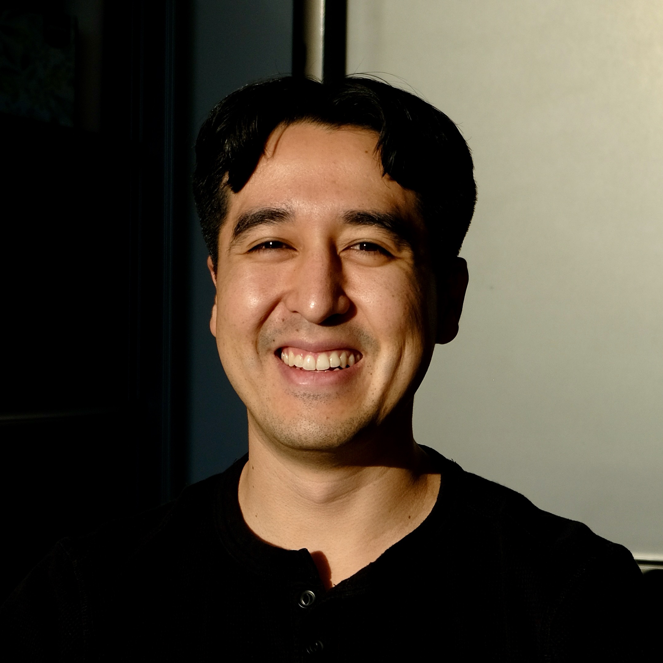 headshot_1_smile_edit.jpeg